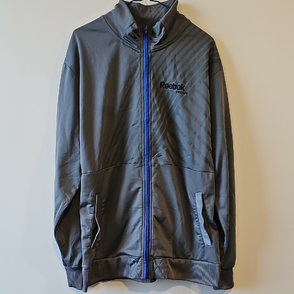 Reebok Other - Reebok Lqrge Gray Zip Up Jacket with Blue Accents
